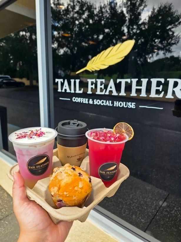 Drinks and a pastry outside Tail Feather